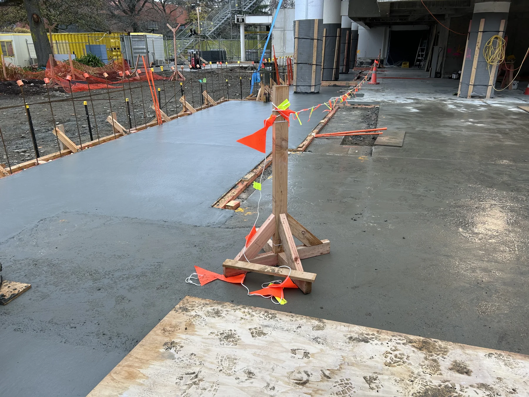 Newly completed concrete slab and formed edges at the project site
