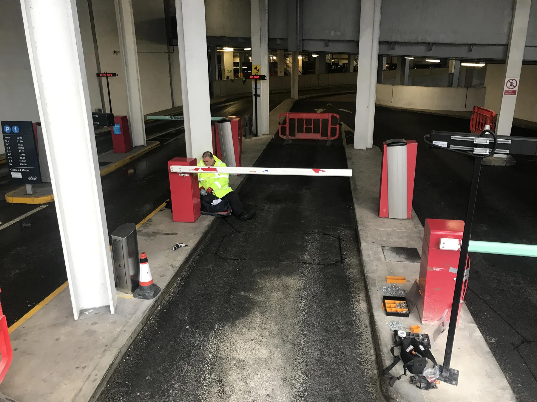 Barrier equipment being installed in an operating lane at Eden Shopping Centre