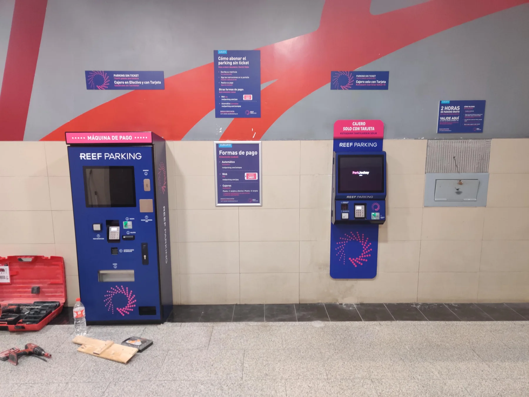 REEF Parking payment kiosks and customer signage at Zubiarte