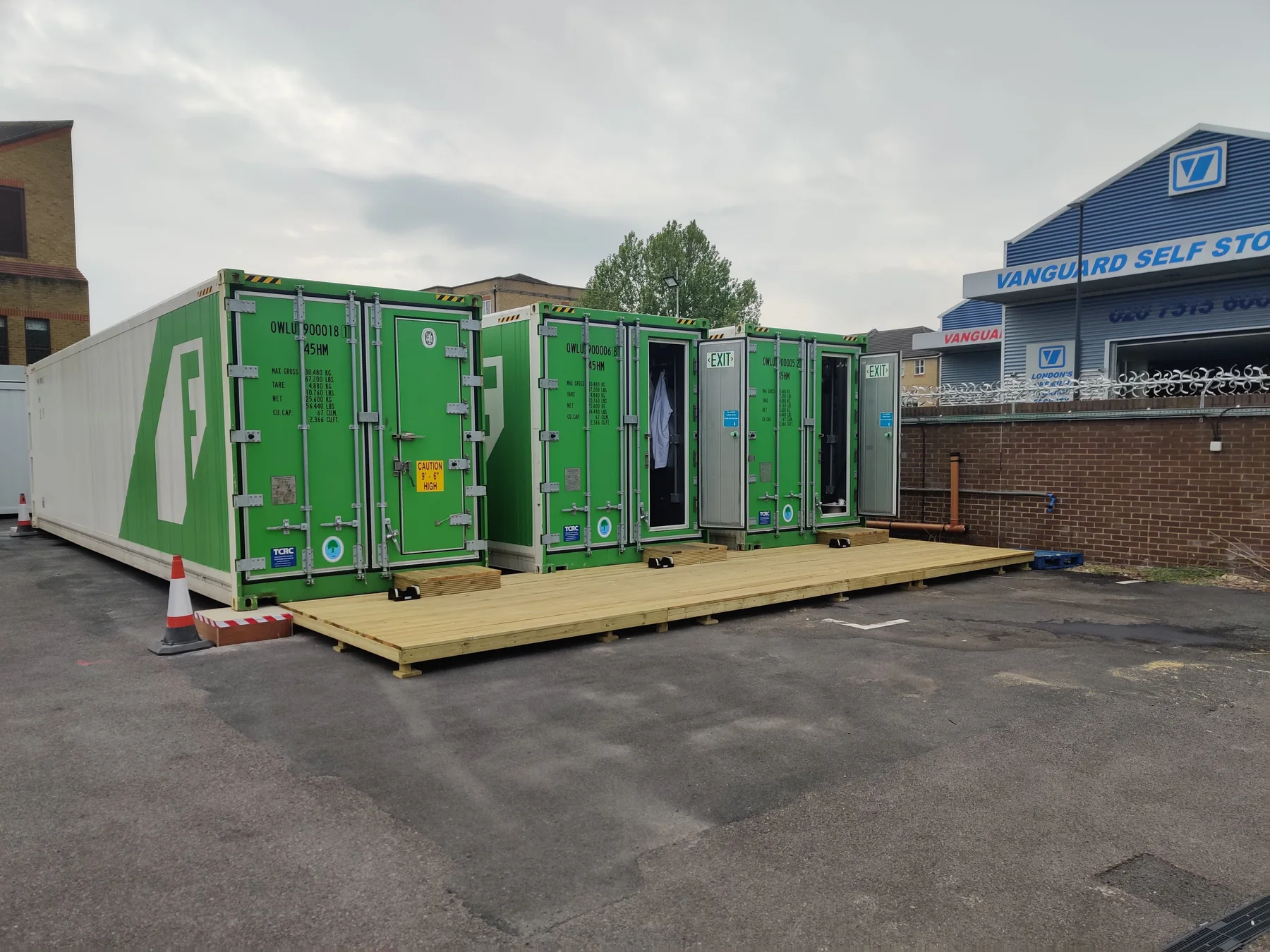 Wider view of container farm modules within the multipurpose REEF hub