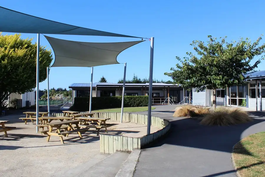 Fernside School buildings and shaded outdoor courtyard in Canterbury, New Zealand