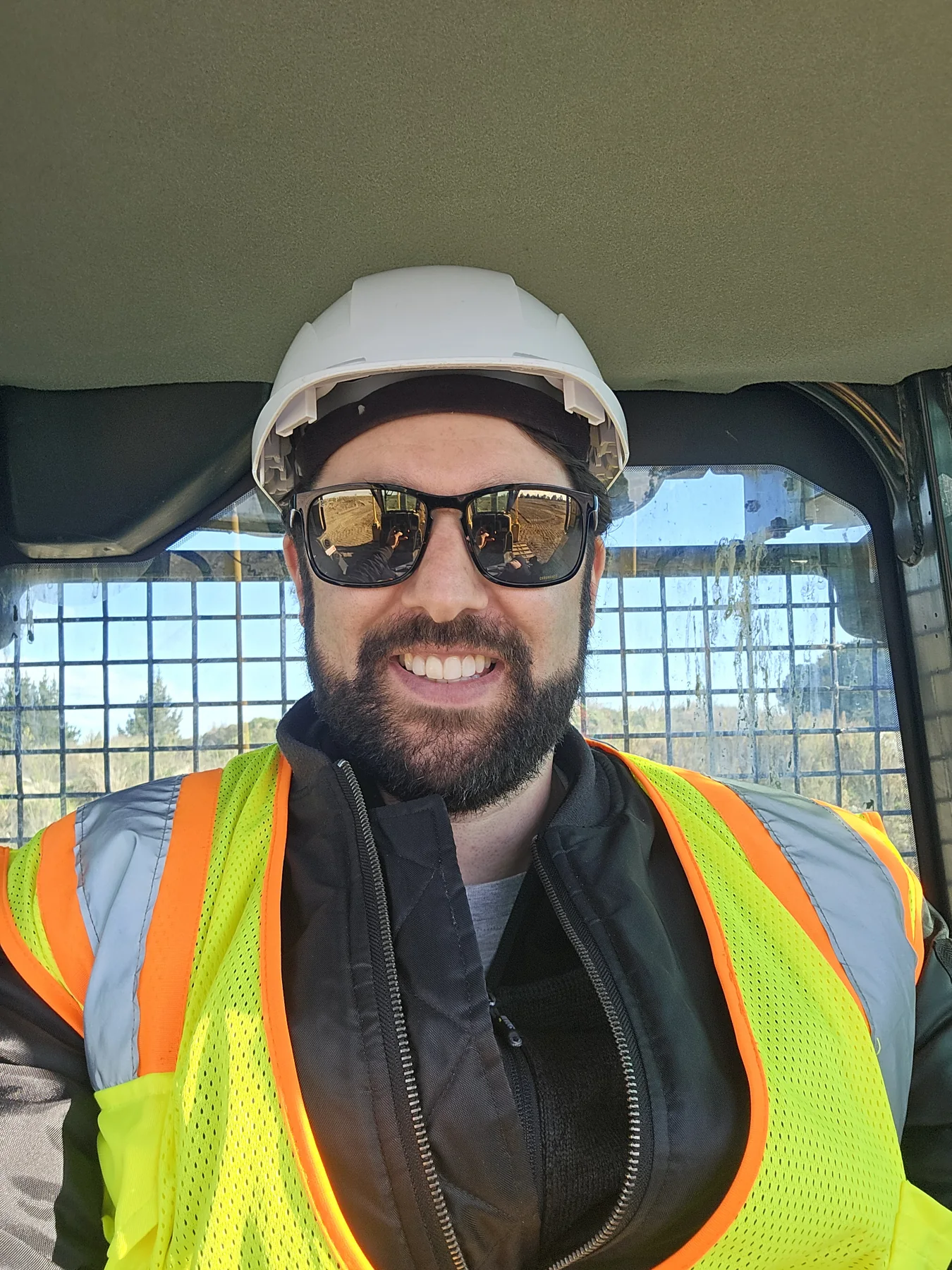 Josh Bohan inside construction machinery during a team training day